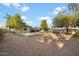 Large backyard with gravel and a covered patio area at 1413 E Windsor Ave, Phoenix, AZ 85006
