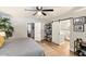 Main bedroom with king bed and access to bathroom with barn door at 1413 E Windsor Ave, Phoenix, AZ 85006