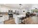 Updated kitchen with white cabinets and stainless steel appliances at 1413 E Windsor Ave, Phoenix, AZ 85006