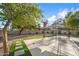 Spacious backyard with gazebo, artificial turf, and gravel at 1413 E Windsor Ave, Phoenix, AZ 85006