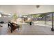 Covered patio with seating area and artificial turf at 1413 E Windsor Ave, Phoenix, AZ 85006