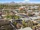 Aerial view of a residential neighborhood with mountain views in the background at 1413 E Windsor Ave, Phoenix, AZ 85006