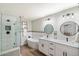 Spa-like bathroom with double vanity and soaking tub at 1413 E Windsor Ave, Phoenix, AZ 85006