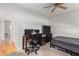 Bedroom with desk, chair, TV and twin bed at 4701 N 68Th St # 144, Scottsdale, AZ 85251