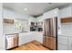 Modern kitchen with stainless steel appliances and contemporary cabinetry at 4701 N 68Th St # 144, Scottsdale, AZ 85251