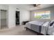Bedroom with large closet, window, and ceiling fan at 4701 N 68Th St # 144, Scottsdale, AZ 85251