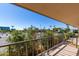 View from balcony overlooking the parking lot and landscaping at 4701 N 68Th St # 144, Scottsdale, AZ 85251