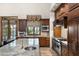 Island kitchen features granite countertops, custom cabinetry, and a breakfast bar at 20242 N 103Rd Way # 1246, Scottsdale, AZ 85255