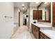 Bathroom with soaking tub, double vanity, and view to other rooms at 20242 N 103Rd Way # 1246, Scottsdale, AZ 85255