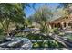 Landscaped backyard with a stunning pool and spa at 20242 N 103Rd Way # 1246, Scottsdale, AZ 85255