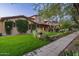 Beautiful home with lush landscaping and stone accents at 20242 N 103Rd Way # 1246, Scottsdale, AZ 85255