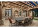 Outdoor patio with dining area, pergola, and built-in grill at 20242 N 103Rd Way # 1246, Scottsdale, AZ 85255