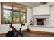 Home gym with Peloton bike and large windows offering natural light at 20242 N 103Rd Way # 1246, Scottsdale, AZ 85255