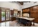 Large kitchen with granite island, stainless steel appliances, and French doors at 20242 N 103Rd Way # 1246, Scottsdale, AZ 85255