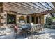 Outdoor dining area with a pergola, perfect for entertaining guests at 20242 N 103Rd Way # 1246, Scottsdale, AZ 85255