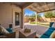 Outdoor patio with seating area and pergola at 980 S 220Th Ln, Buckeye, AZ 85326