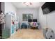 Home office with built in shelving and desk at 980 S 220Th Ln, Buckeye, AZ 85326