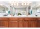 Elegant bathroom featuring a double vanity and updated fixtures at 980 S 220Th Ln, Buckeye, AZ 85326