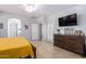 Spacious bedroom with large dresser and ensuite bathroom access at 980 S 220Th Ln, Buckeye, AZ 85326