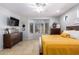 Bright bedroom featuring a large window and stylish dresser at 980 S 220Th Ln, Buckeye, AZ 85326