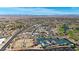 Aerial view of community tennis courts and bocce ball area at 14223 W White Rock Dr, Sun City West, AZ 85375