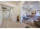 Hallway leading to living areas with tile flooring at 14223 W White Rock Dr, Sun City West, AZ 85375