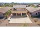 Aerial view of house, backyard patio, and mountain views at 1926 E Siesta Ln, Phoenix, AZ 85024