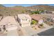 Aerial view of a residential neighborhood, showcasing houses with tile roofs at 1926 E Siesta Ln, Phoenix, AZ 85024