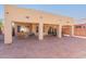 Covered patio with seating area and outdoor lighting at 1926 E Siesta Ln, Phoenix, AZ 85024