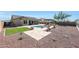 Spacious backyard with a pool, pergola, and outdoor kitchen at 16918 S 180Th Dr, Goodyear, AZ 85338