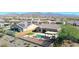 Aerial view showcasing the home, pool, and surrounding neighborhood at 16918 S 180Th Dr, Goodyear, AZ 85338