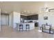 Spacious kitchen with island, stainless steel appliances, and breakfast bar at 16918 S 180Th Dr, Goodyear, AZ 85338