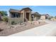 One-story home with stone accents and desert landscaping at 16918 S 180Th Dr, Goodyear, AZ 85338