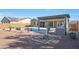 Private backyard oasis with a pool, outdoor kitchen and pergola at 16918 S 180Th Dr, Goodyear, AZ 85338
