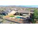 Aerial view showing the house's backyard, pool, and mountain backdrop at 16918 S 180Th Dr, Goodyear, AZ 85338