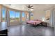 Spacious main bedroom with large windows, plush carpet, and plenty of natural light at 16918 S 180Th Dr, Goodyear, AZ 85338