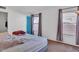 Main bedroom with double bed and window with curtains at 15402 N 56Th Ave, Glendale, AZ 85306