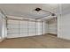 Spacious two-car garage featuring automatic garage door opener at 15402 N 56Th Ave, Glendale, AZ 85306