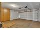 Two-car garage with ample storage cabinets and overhead storage at 15402 N 56Th Ave, Glendale, AZ 85306
