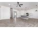 Modern kitchen featuring white shaker cabinets, grey island, and stainless steel appliances at 10530 E Baltimore St, Apache Junction, AZ 85120