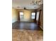 Spacious living room with tile and laminate flooring at 9406 W Elwood St, Tolleson, AZ 85353
