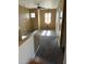 Spacious carpeted bedroom with a ceiling fan and window at 9406 W Elwood St, Tolleson, AZ 85353