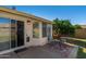 Relaxing backyard with patio, seating area, and beautiful landscaping at 2028 E Devon Rd, Gilbert, AZ 85296