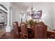 Elegant dining room with hardwood floors and a chandelier at 2300 E Sanoque Ct, Gilbert, AZ 85298