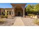 Elegant entryway with stone arch, double doors and a walkway at 2300 E Sanoque Ct, Gilbert, AZ 85298