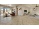 Bright and airy living room with tile floors and multiple windows at 36908 N 19Th St, Phoenix, AZ 85086