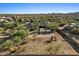 Aerial view showing house, pool, playset, and surrounding desert landscape at 36908 N 19Th St, Phoenix, AZ 85086