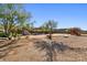 Large backyard with fire pit and play structure at 36908 N 19Th St, Phoenix, AZ 85086