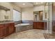 Elegant bathroom with a large soaking tub and walk-in shower at 36908 N 19Th St, Phoenix, AZ 85086