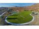 Community park with sports courts, playground, and open green space at 32513 N 135Th Dr, Peoria, AZ 85383